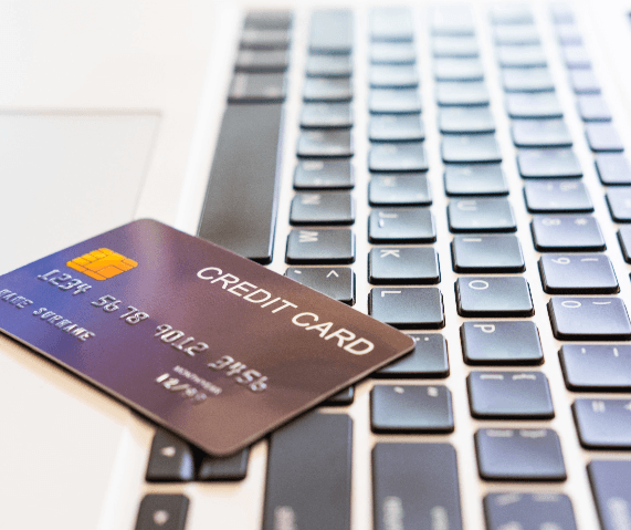 A credit card laying on a keyboard